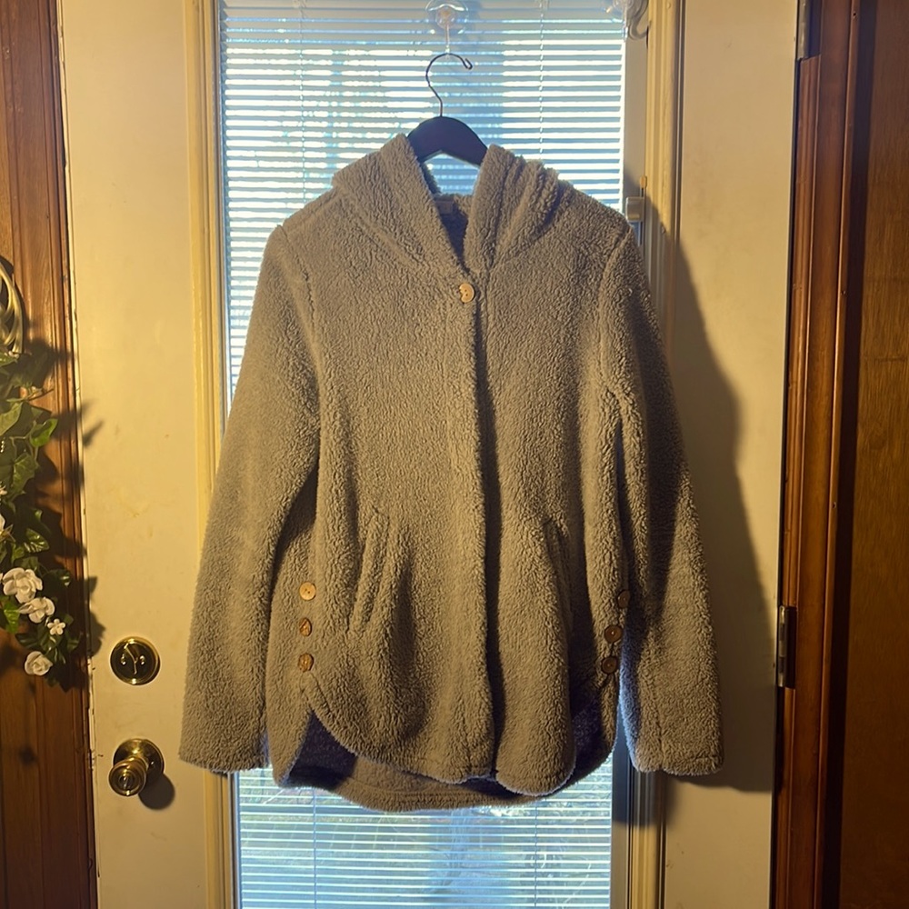 Lite gray hoodie jacket. Button down in front with pockets.
